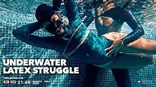 Underwater Latex Struggle: lesbian latex & bondage diving porn