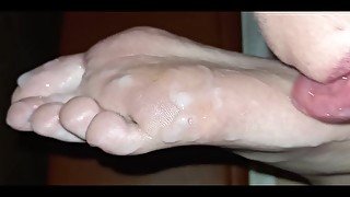 Worshipping hands and stinky feet of a young blonde and covering her with cum