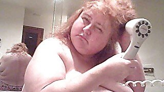 MILF BBW redhead blows dry hair nude