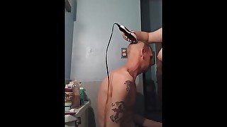 Chubby girl shaving husband bald