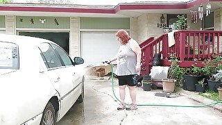 Sexy Mature bbw redhead Nurse Vicki washes her car!