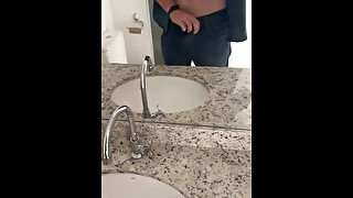 broker urinates in the sink and masturbates before the client arrives