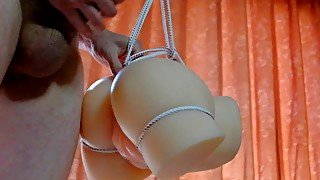 Cute guy tie up his sex toy in front of the window and bang it nicely part 2