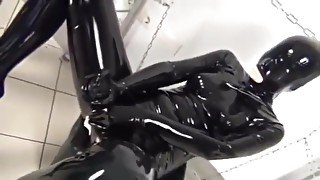 lesbian mastubed latex catsuit strapon