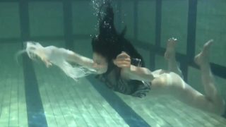 Blackhaired beauty Irina underwater