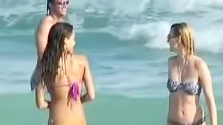 Jessica Alba wearing a purple bikini gets caught on voyeur's cam on a beach