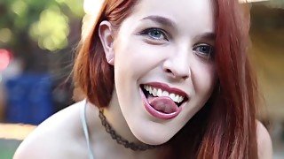 Smoking is an erotic treat when this redhead does it