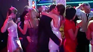 Horny brunette bride eats a big cock in public