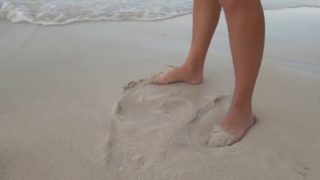 Beach footjob