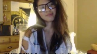 Asian teases and masturbates on bed