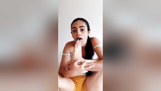 Teen With A Ponytail Sucking Her Toes With Colorful Nail Polish