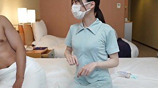 Japanese nurse gives a patient a hand job