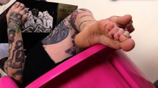 Tattooed redhead barefoot massage