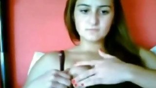 Webcam solo with a lovely European teen kneading her nipples