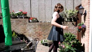 Alison masturbating in the garden again - sexy crossdresser