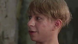 Young sub twink Daniel Hausser tied up in BDSM dungeon