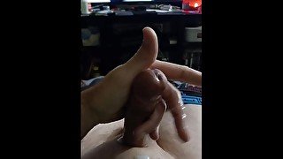 Stroking dick to massive cum shot