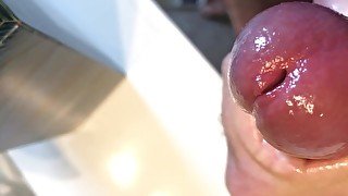 Close up oiled cock spurts cum from ruined cumshot