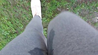 Nicoletta gets her yoga pants completely wet in a public park - Extreme pee exposed