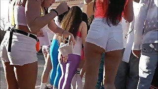 Lots of awesome bubble butts in shorts are taped on cam outdoors