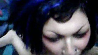 Freaky emo brunette with pierved lips happily sucking dick