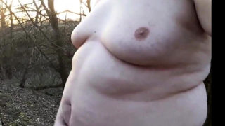 Chubby masturbates in the woods