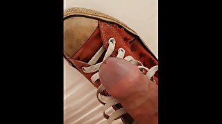 this worn out hot red converse chucks are first to be cum covered