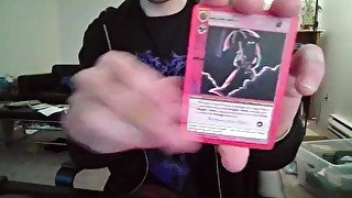 Cute Nerd Opening a Pack of Cards