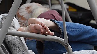 Lazy barefoot Sunday on the swing