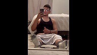 Latino teen jerks off and cums in front of a mirror