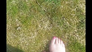 Bare feet in the grass