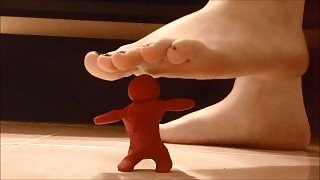 Girl crushing clay men with Barefeet