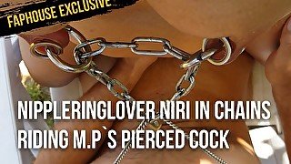 nippleringlover Niri in chains riding M.P`s pierced cock outdoors in the garden