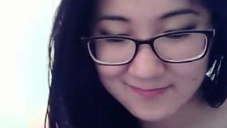 Sexy Asian cam model with glasses loves to chat with strang