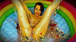 Slime Pool Gummy Snakes 2. I play in a pool of slime and shove gummy snakes in my pussy.