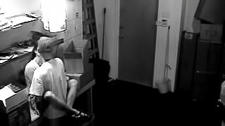 A hidden security cam catches a couple fucking at work