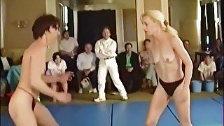 Topless Housewives mat wrestling