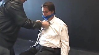 BG Hot beefy executive bound, gagged and stripped