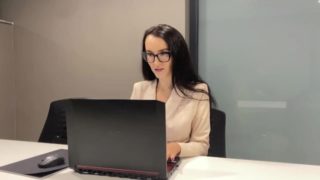 Lustful secretary masturbates under the desk in the office