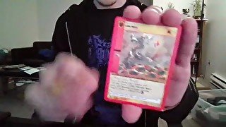 Cute Nerd Opening a Pack of Cards