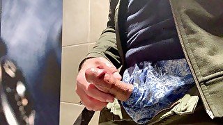 Jerking my cock in the public restroom at the airport