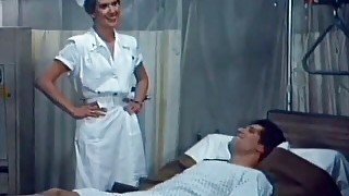 Lovely nurse is riding her patient's big cock