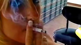 Blonde cougar smoking in solo