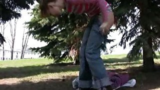 Russian girl in the park gets wet between her legs