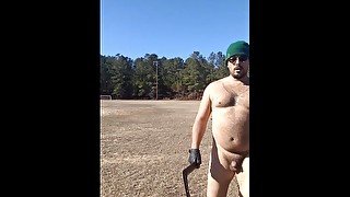 Throwing boomerangs naked at Public park