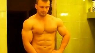 RUSSIAN BODYBUILDER STRIP AND CUM