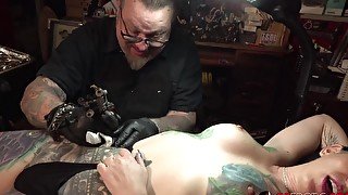 Marie Bossette gets a painful tattoo on her leg