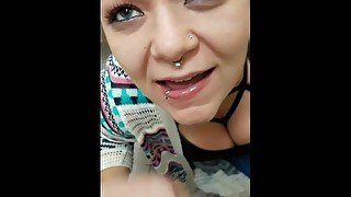 Kali Swallows in a bathroom stall