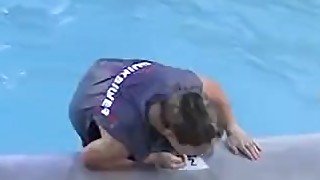 Four dudes get wet in a pool before having group spank