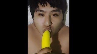 young gay devours a rubber penis